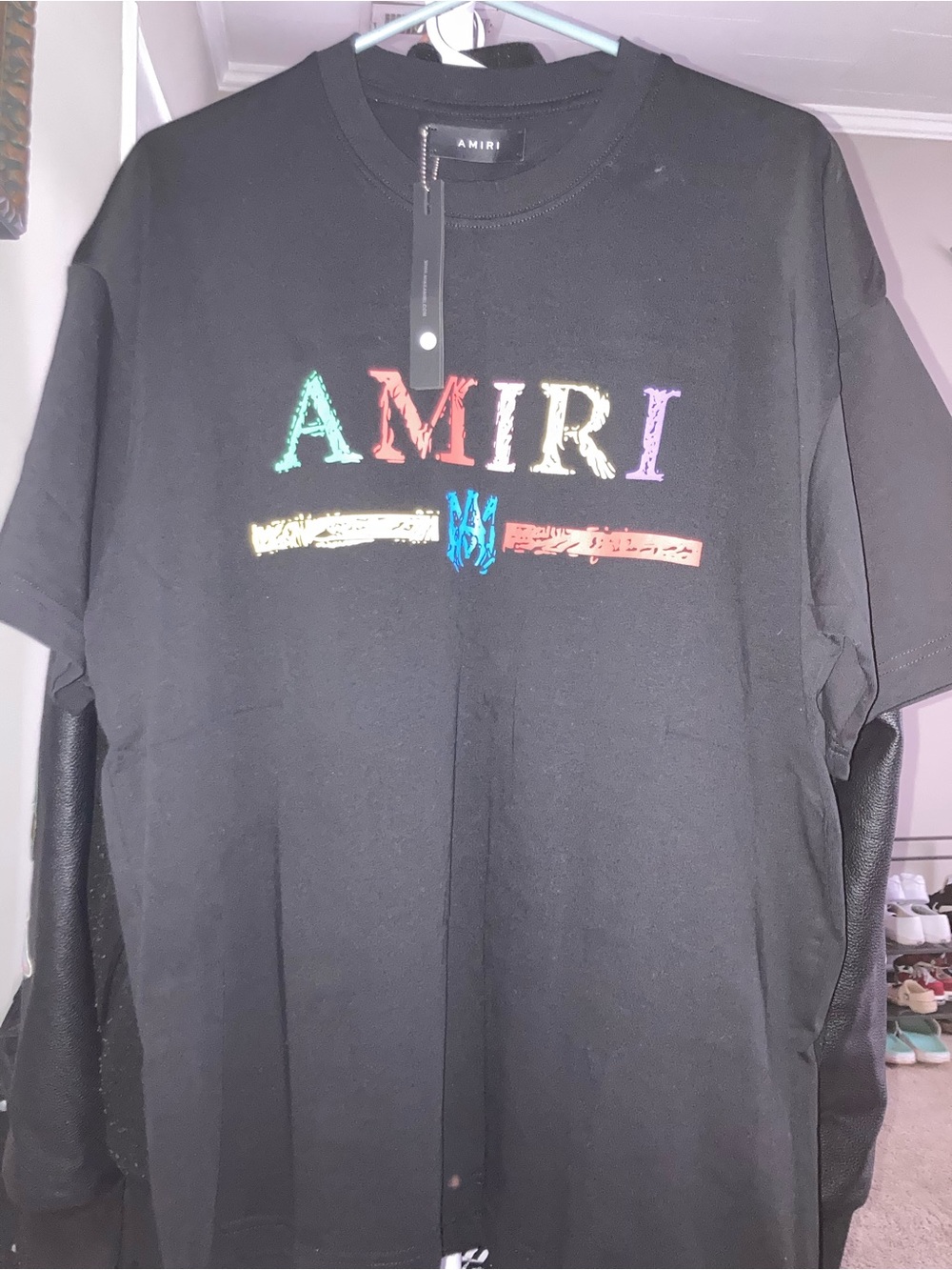 AMIRI Black Tee with Multicolor Distressed Logo
